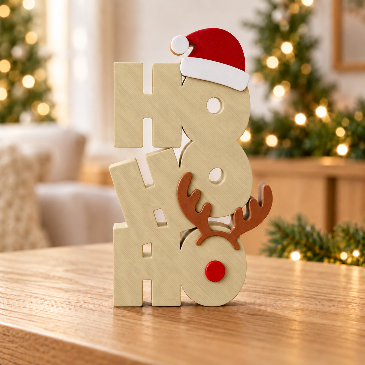 AMATTE Ho Ho Ho sign with beige letters, red and white Santa hat, brown antlers and red nose
